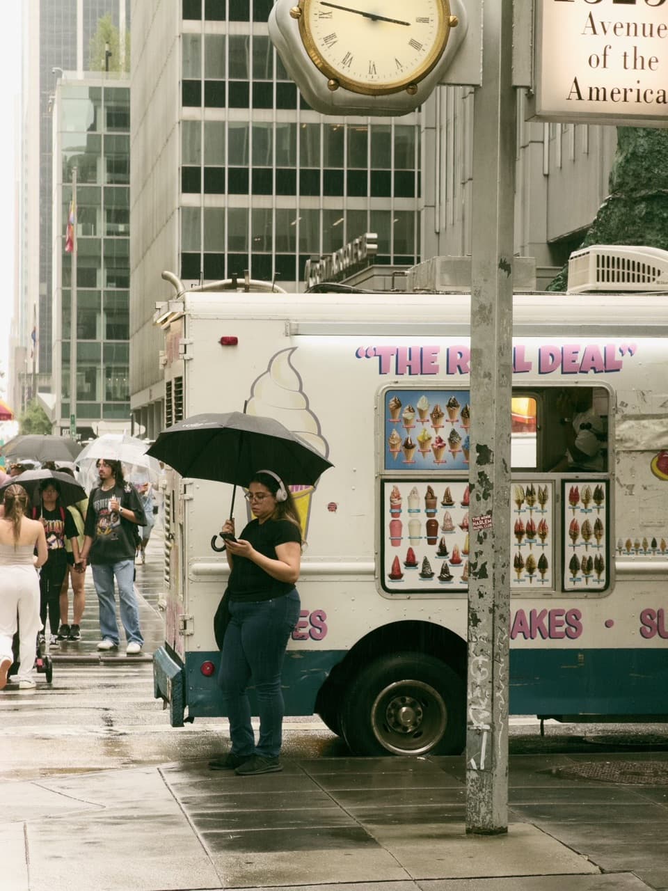 A rainy day beside an ice cream truck